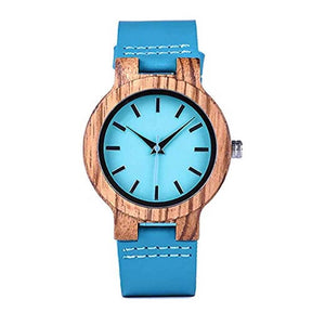 Zebranoholz und ein auffälliges Desing in hellblau machen die Armbadnuhr "Odysee" zu einem must-have für Frauen