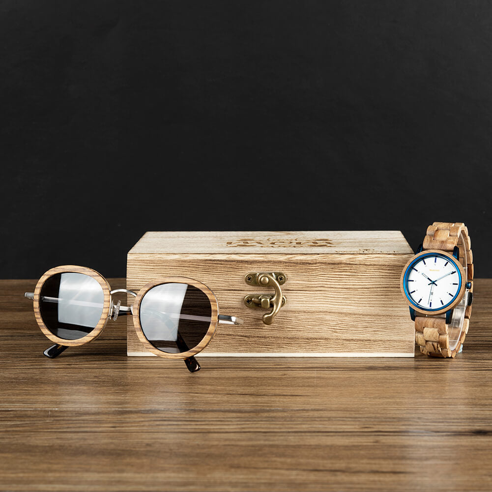 Dieses Set besteht aus einer stylischen Sonnenbrille aus Holz sowie einer Armbanduhr für Damen